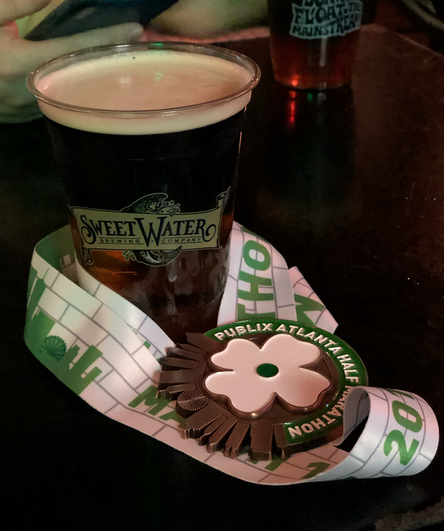 Race medal and beer: the usual pose