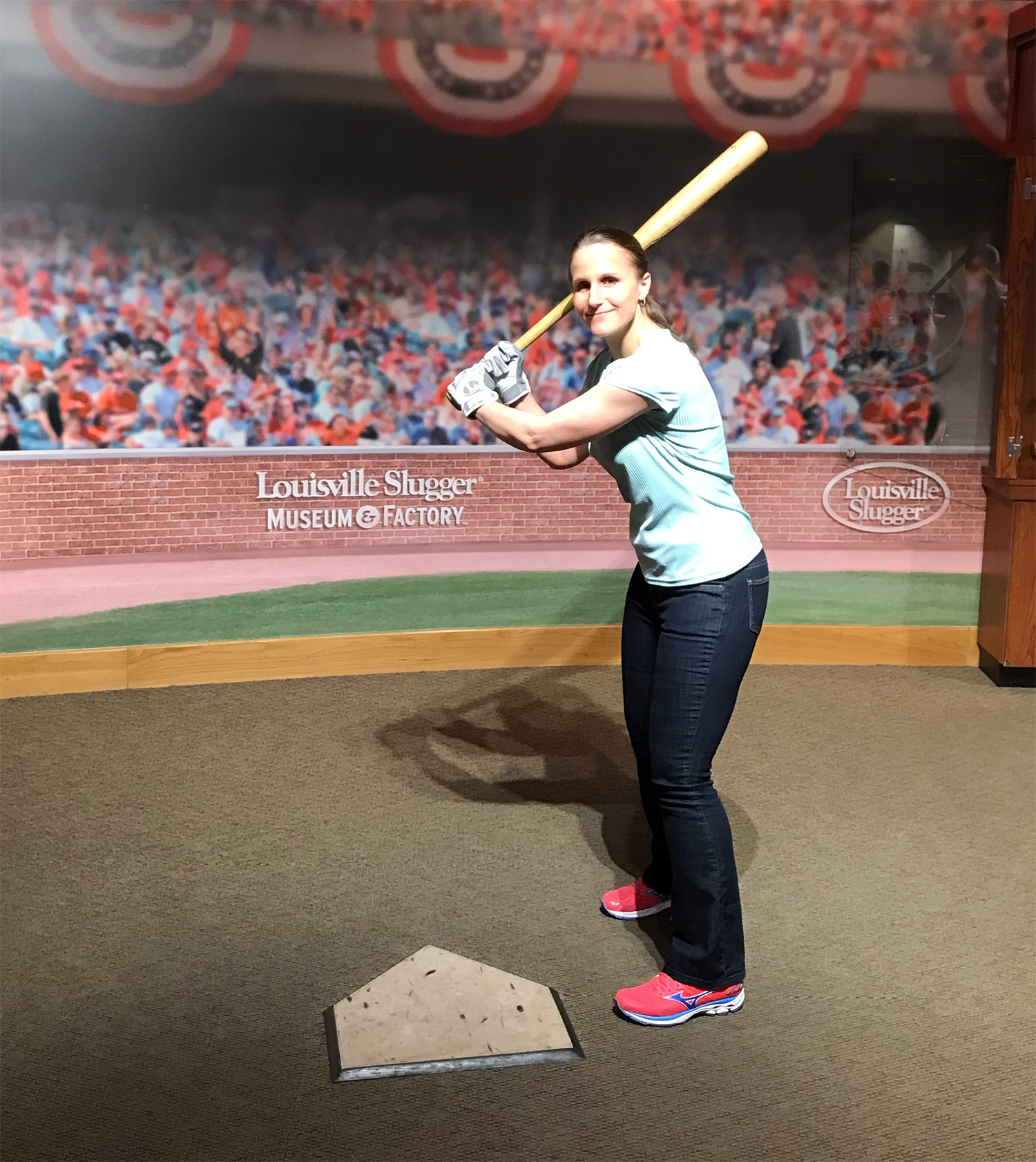 Me holding Lou Whitaker's bat at the Louisville Slugger Museum