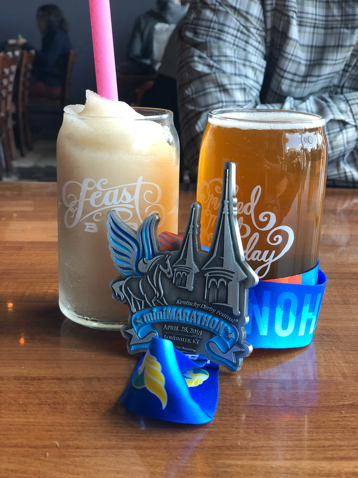 2018 Kentucky Derby miniMarathon medal with a glass of beer