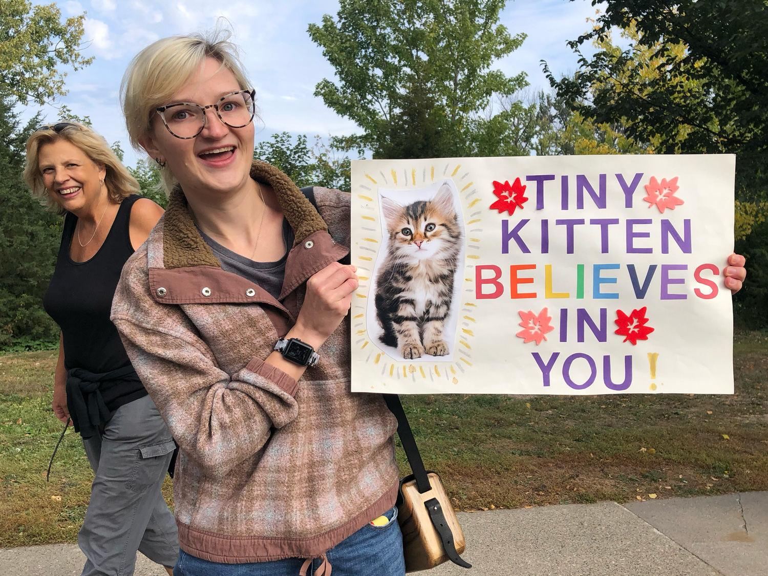 Spectator sign: Tiny Kitten Believes in You