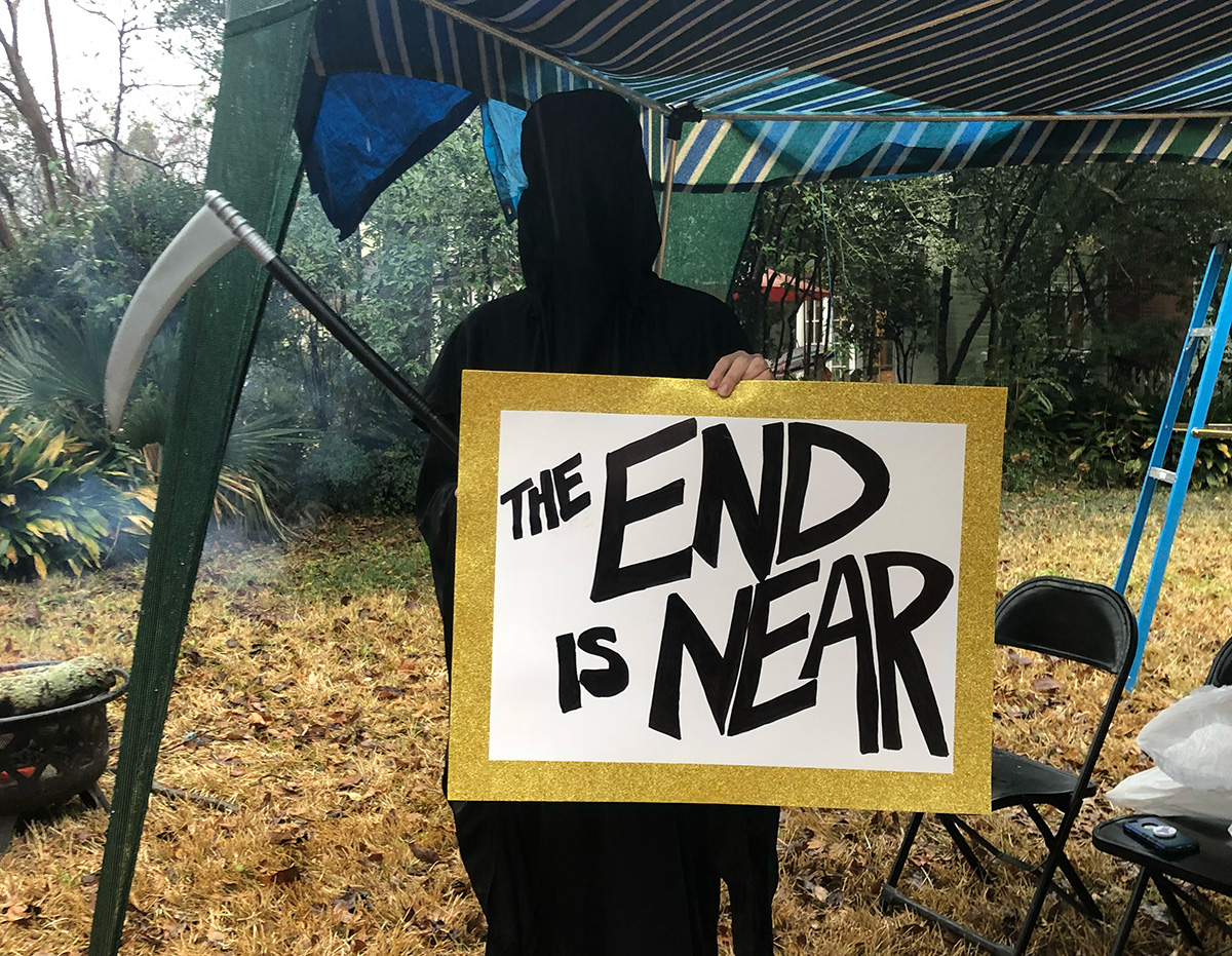 Grim Reaper with 'End is Near' sign