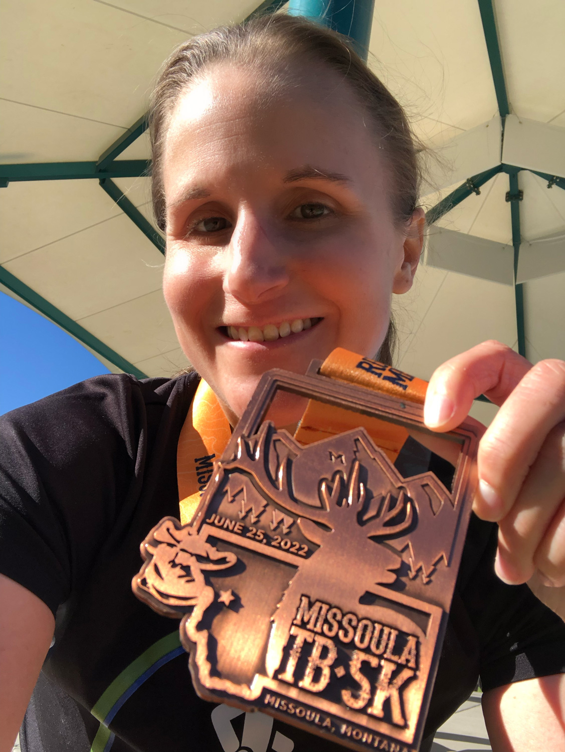 Me with my 2022 Tony Banovich Missoula 5k medal