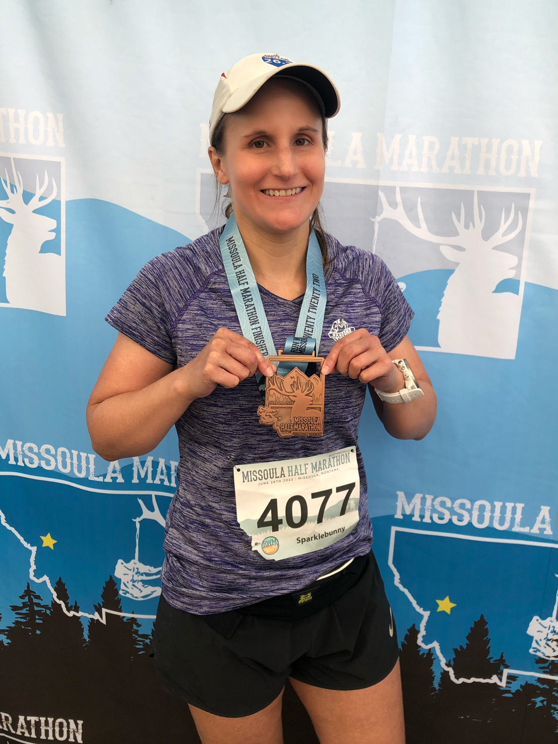 Me with my 2022 Missoula Half Marathon medal