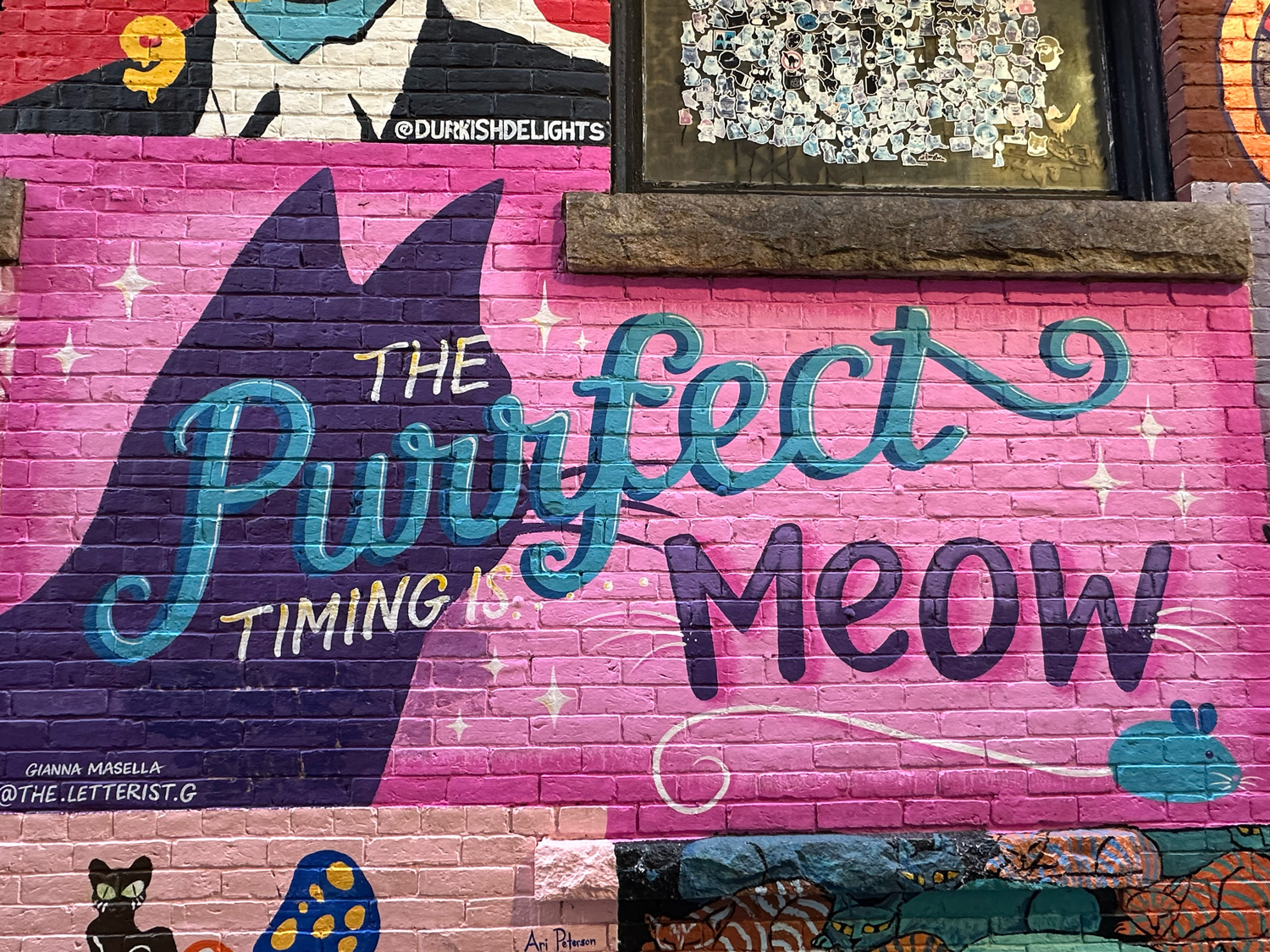 Painted murals of cats in Cat Alley