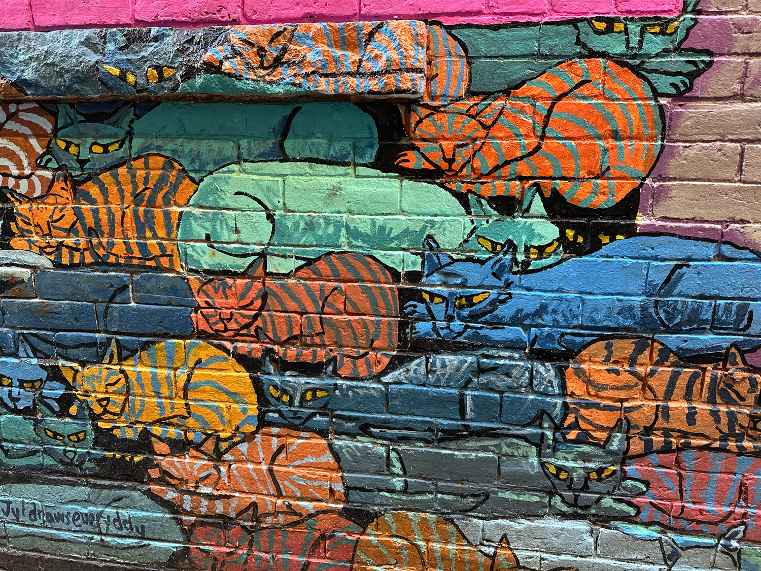 More painted murals of cats in Cat Alley