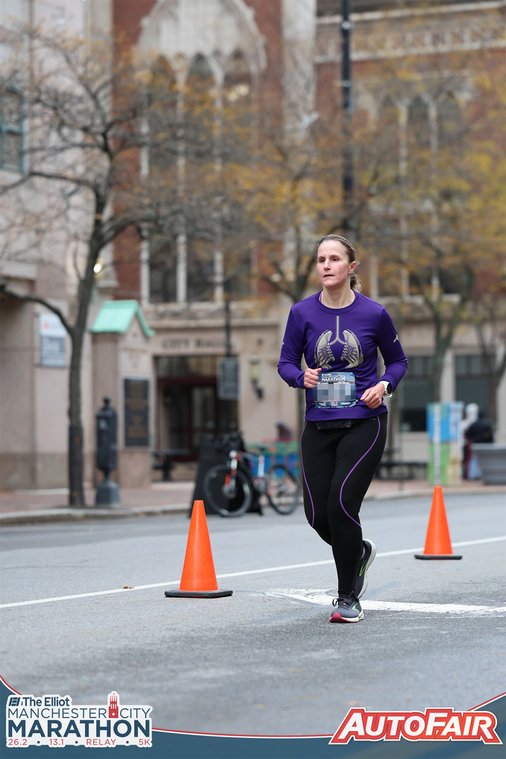 Me running past City Hall along the final stretch