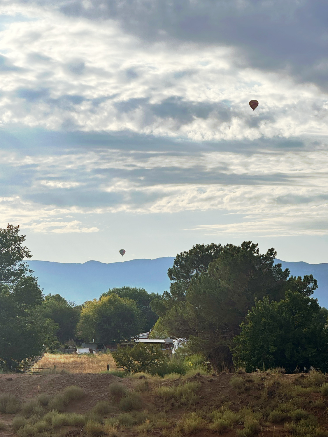 Two hot air balloons in the sky
